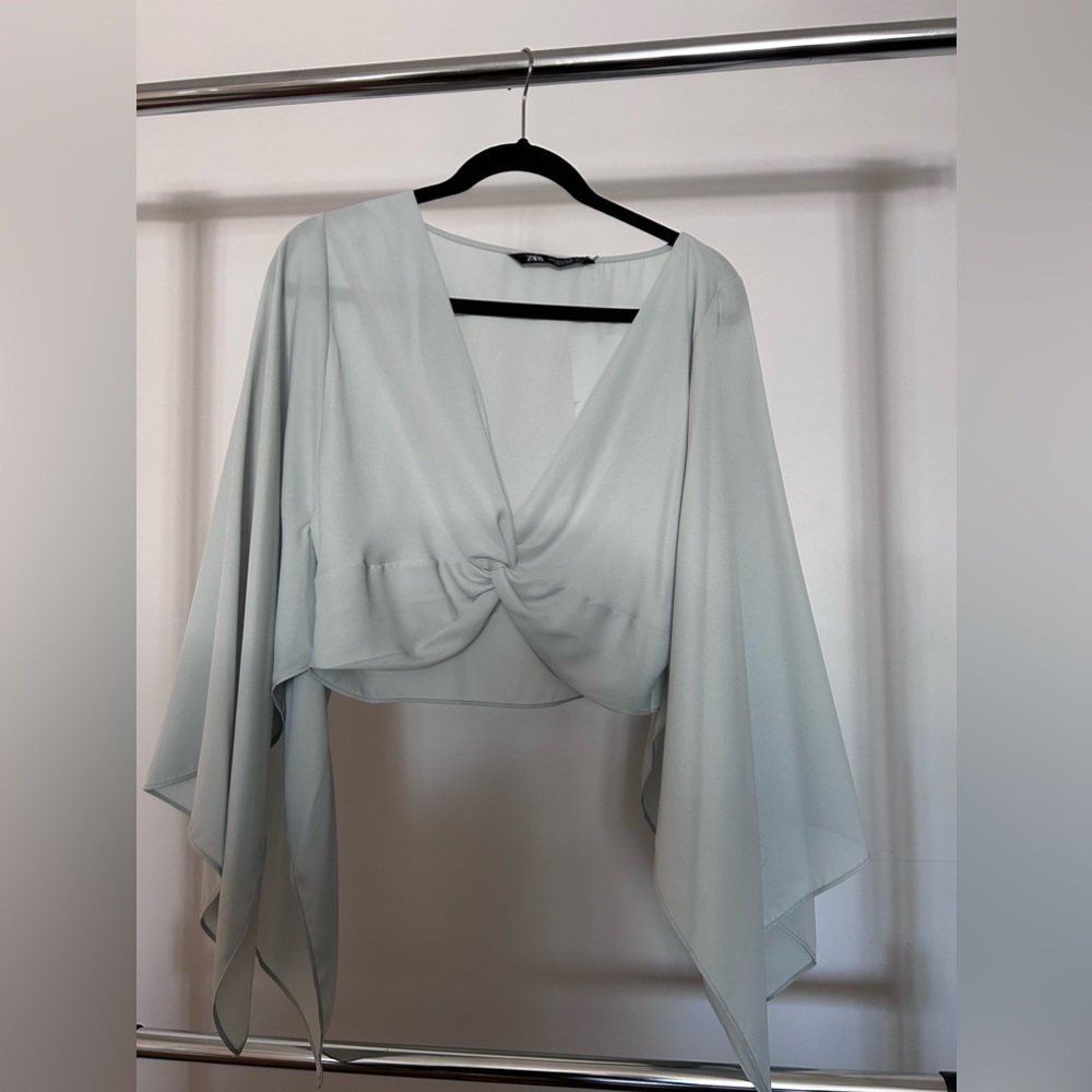 Sea green knotted cropped top with vented long sleeves